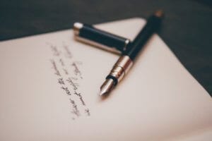 a photo of a fountain pen and a handwritten note