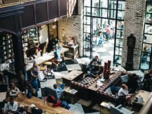an overhead photo of a bustling coffee shop