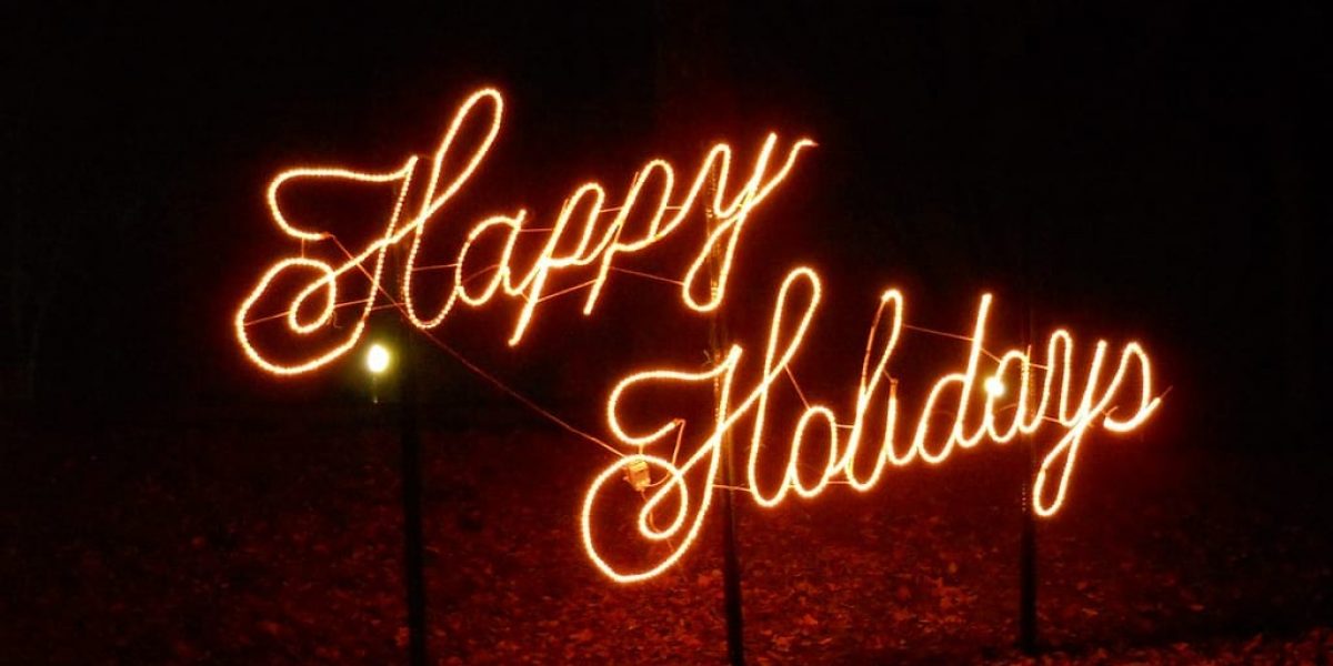"Happy Holidays" written in Christmas lights