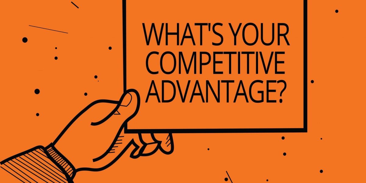 an illustration of a hand holding a sign that says "What's your competitive advantage?"